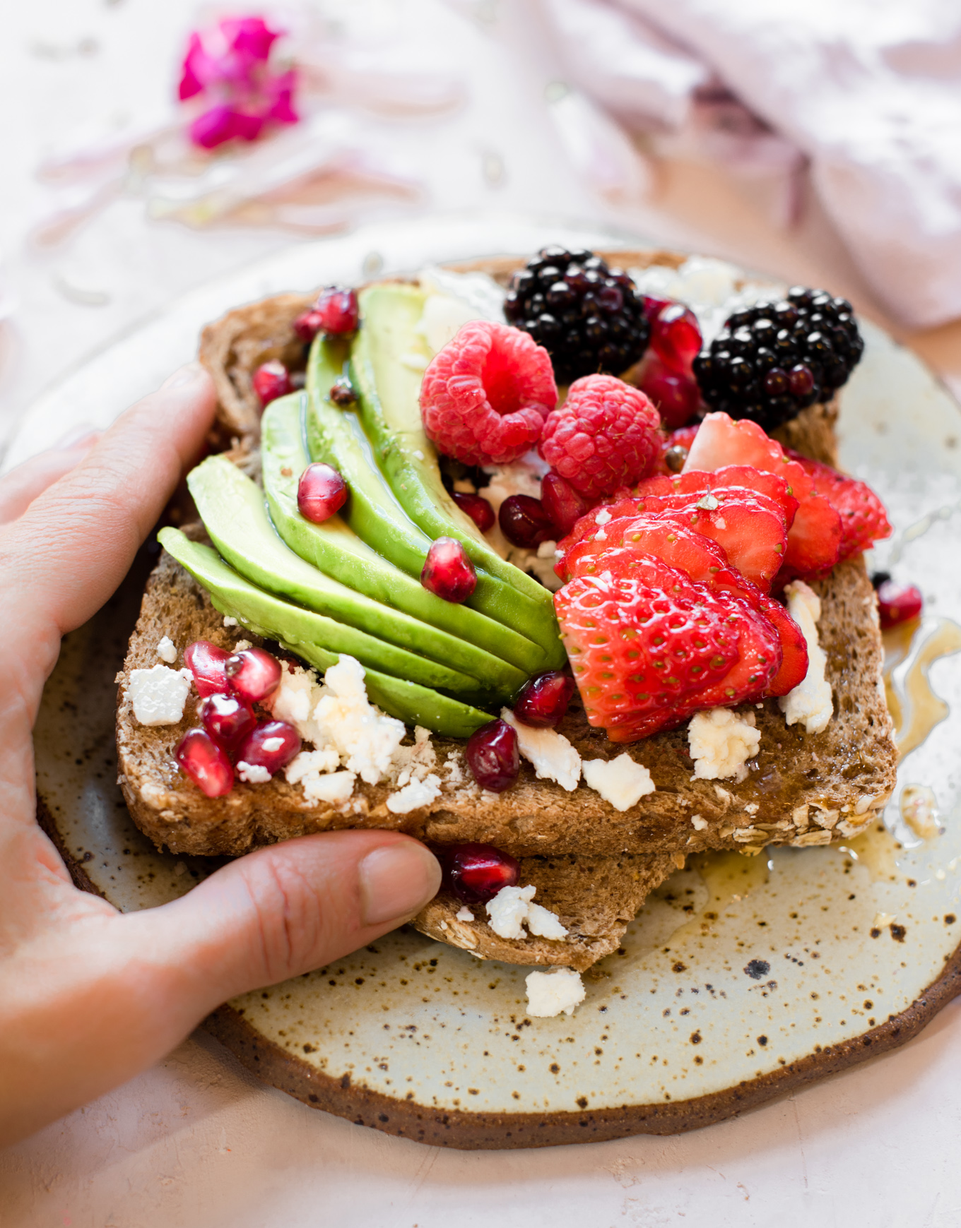 toast with avocado and berries