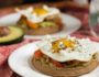 Avocado Egg Waffle with Peppers and Goat Cheese- who says waffles need syrup? These whole grain waffles plus avocado, veggies and egg make a filling and savory breakfast or brunch | 