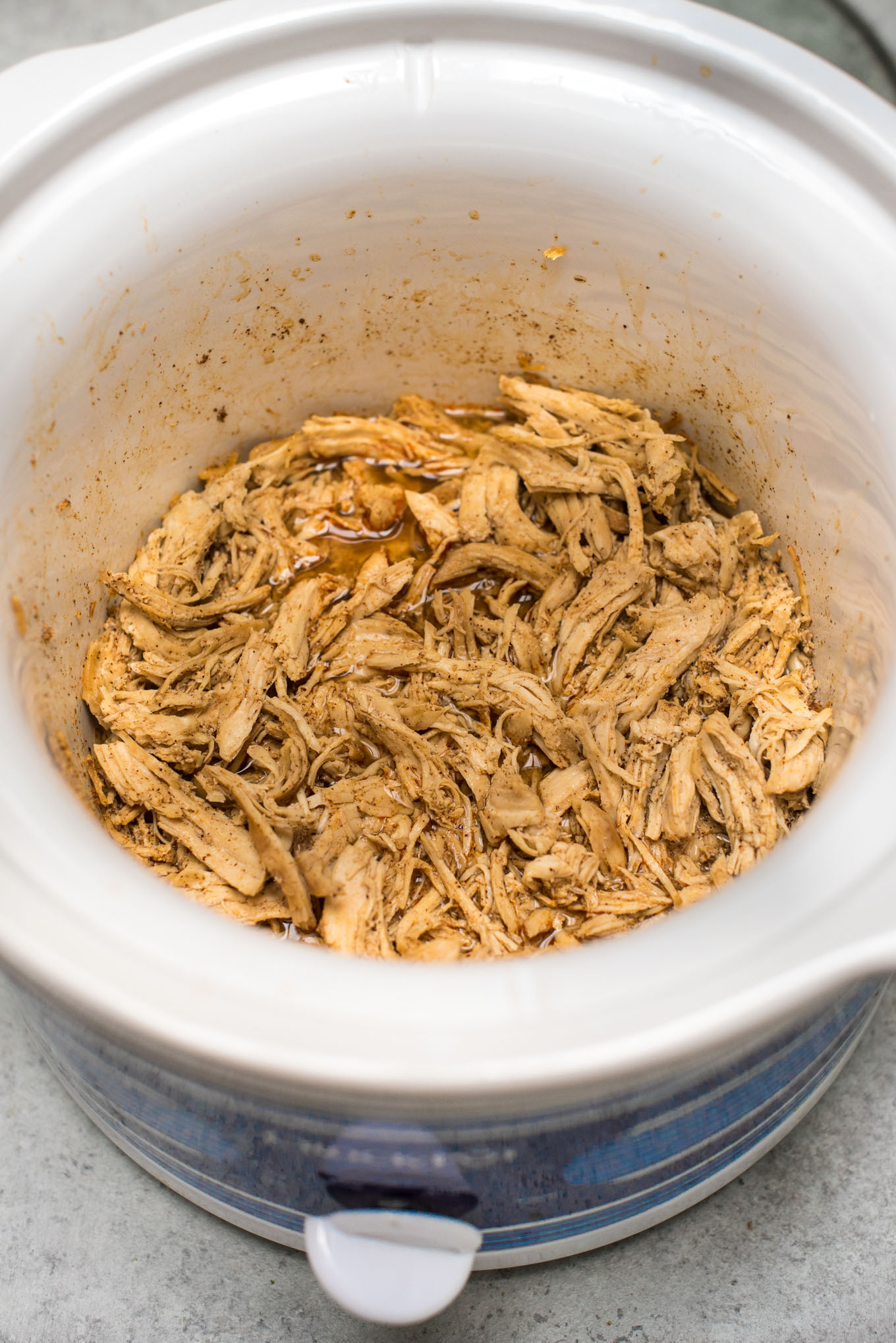 Slow cooker of shredded chicken