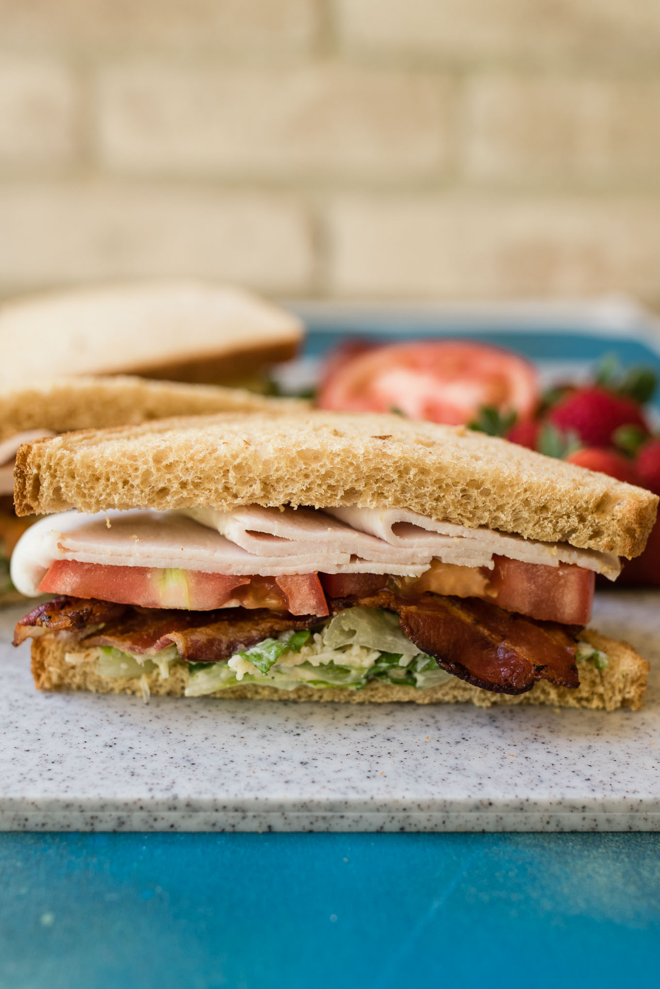 Turkey Caesar BLT Sandwiches are simple to prepare and great to pack for a dinner at the pool or a family picnic.