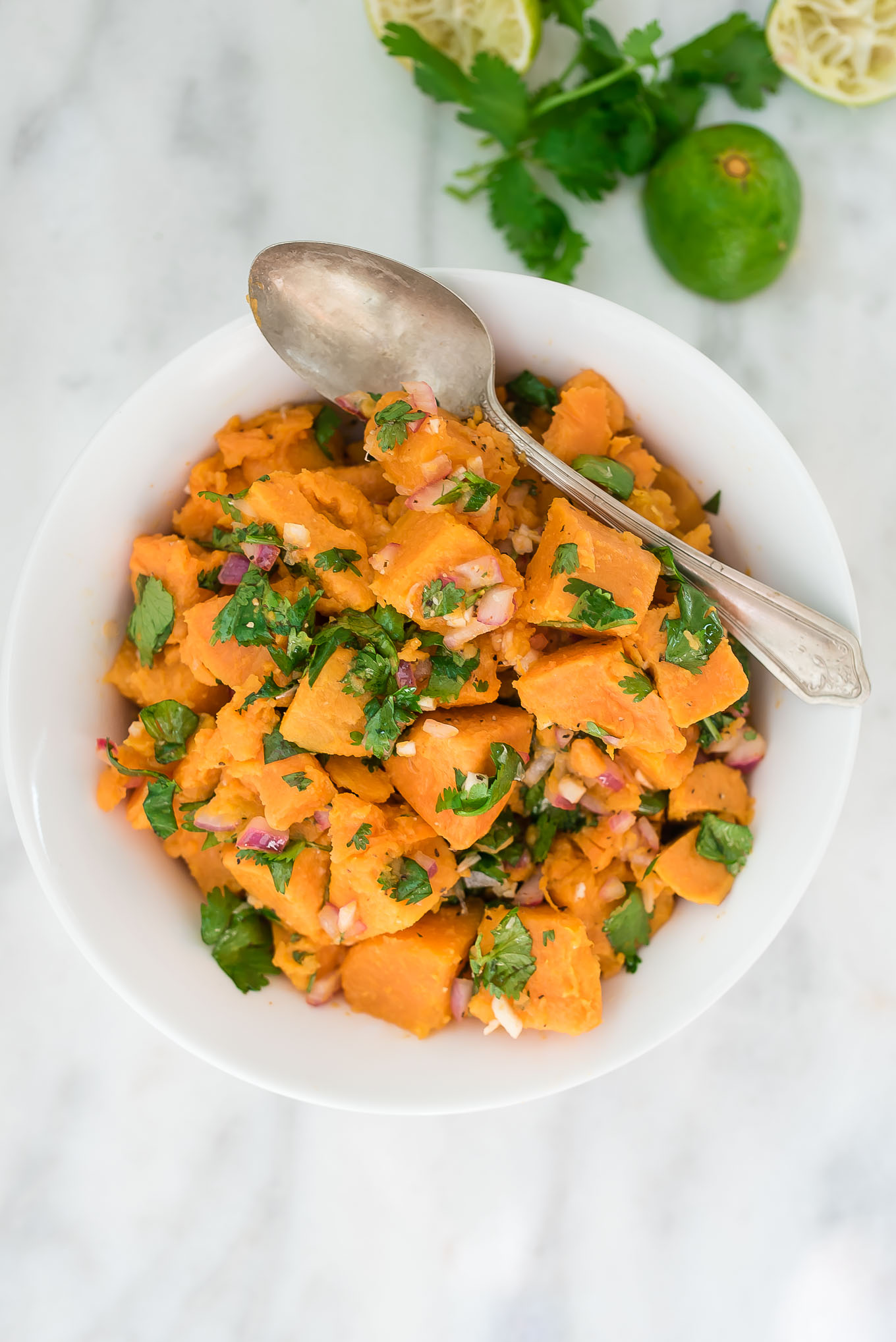 Cilantro Lime Sweet Potato Salad is bursting with flavor from the sweet potatoes and the garlicky and citrus dressing- it's a match made in heaven!