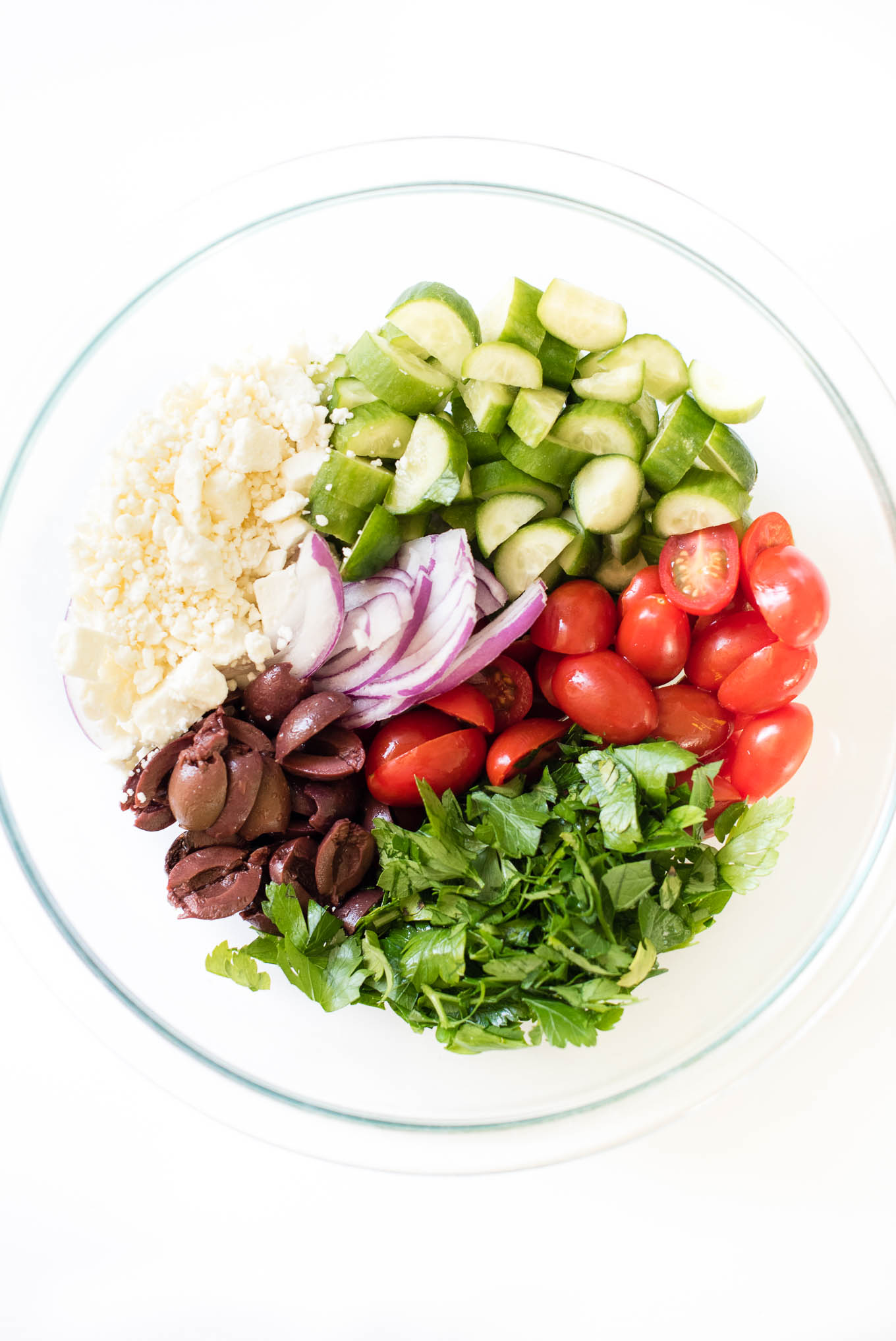 Greek Quinoa Salad is bursting with Mediterranean flavors and is a great make-ahead vegetarian and gluten free salad.