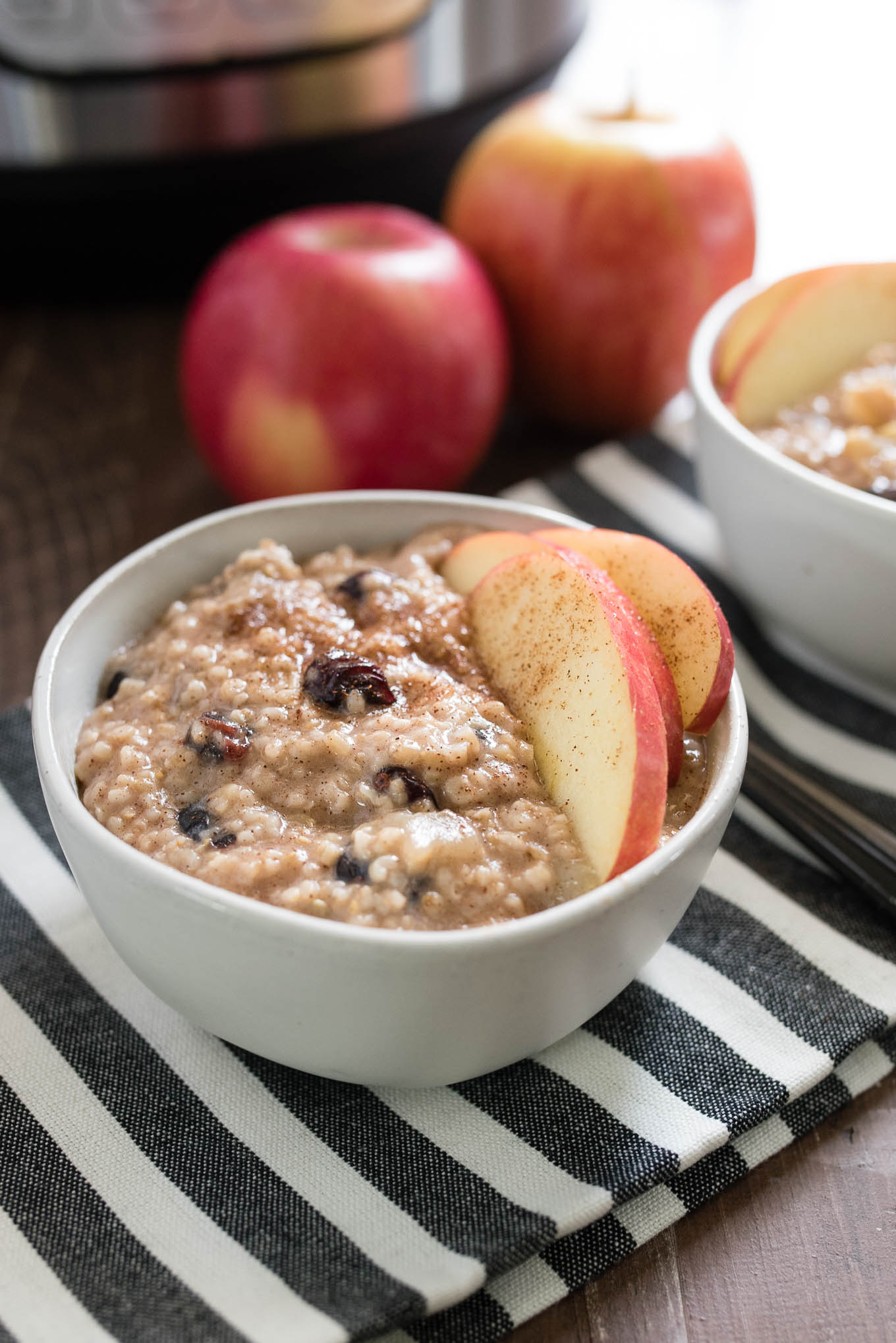 Instant Pot Apple Cranberry Steel Cut Oats are extra creamy and flavorful and you don't have to babysit the stovetop!