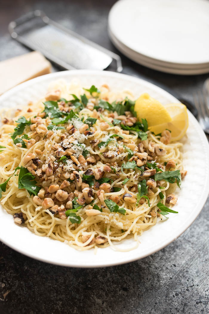 Lemon and Walnut Angel Hair Pasta- ready in less than 15 minutes + vegetarian. A simple weeknight side! | 