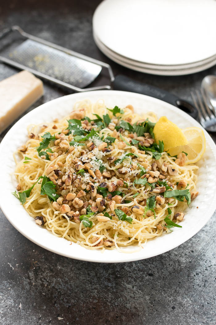 Lemon and Walnut Angel Hair Pasta- ready in less than 15 minutes + vegetarian. A simple weeknight side! | 