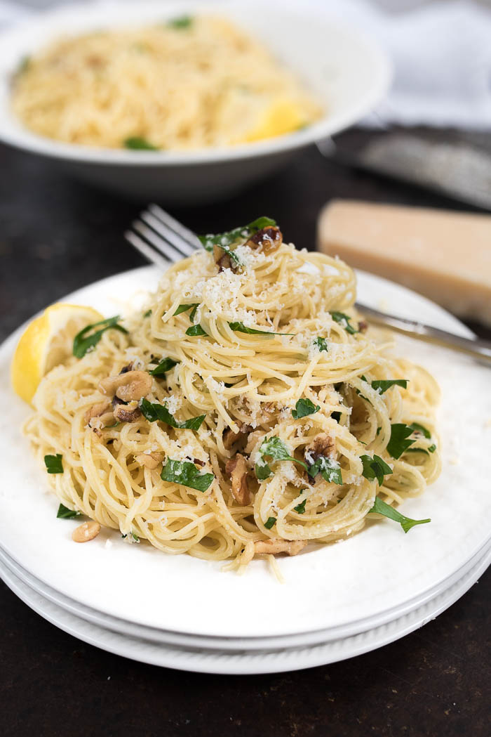 Lemon and Walnut Angel Hair Pasta- ready in less than 15 minutes + vegetarian. A simple weeknight side! | 