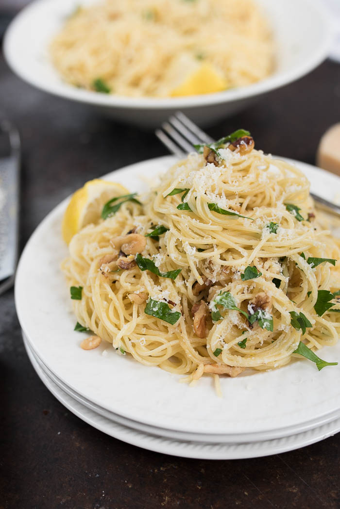 Lemon and Walnut Angel Hair Pasta- ready in less than 15 minutes + vegetarian. A simple weeknight side! | 