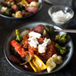 One Pan Roasted Sausage and Vegetables with Marinara and Goat Cheese is low calorie, gluten free and the answer to your dinner dilemma since it only takes a few minutes to prepare and the frees up time while it bakes in the oven.