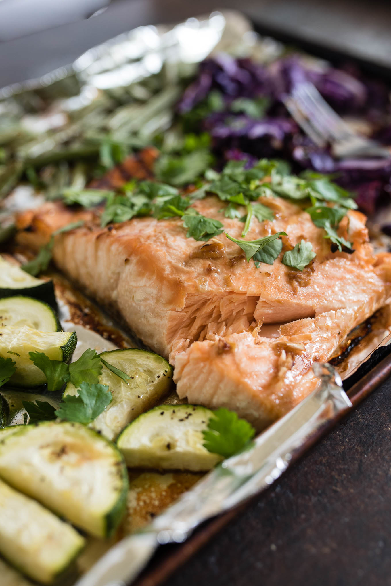 One Sheet Pan Asian Salmon and Veggies is for the healthy conscious salmon lover that wants an easy, tasty and healthy meal.