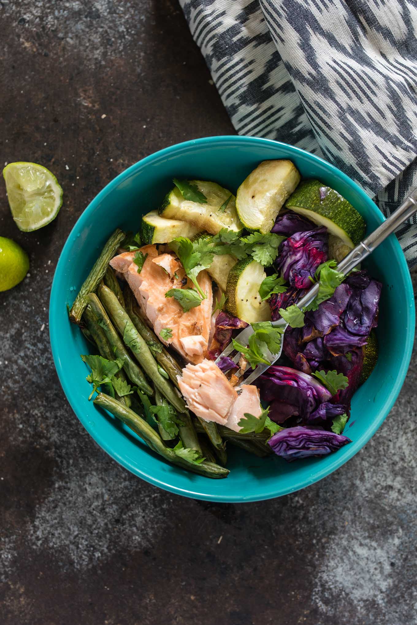 One Sheet Pan Asian Salmon and Veggies is for the healthy conscious salmon lover that wants an easy, tasty and healthy meal.