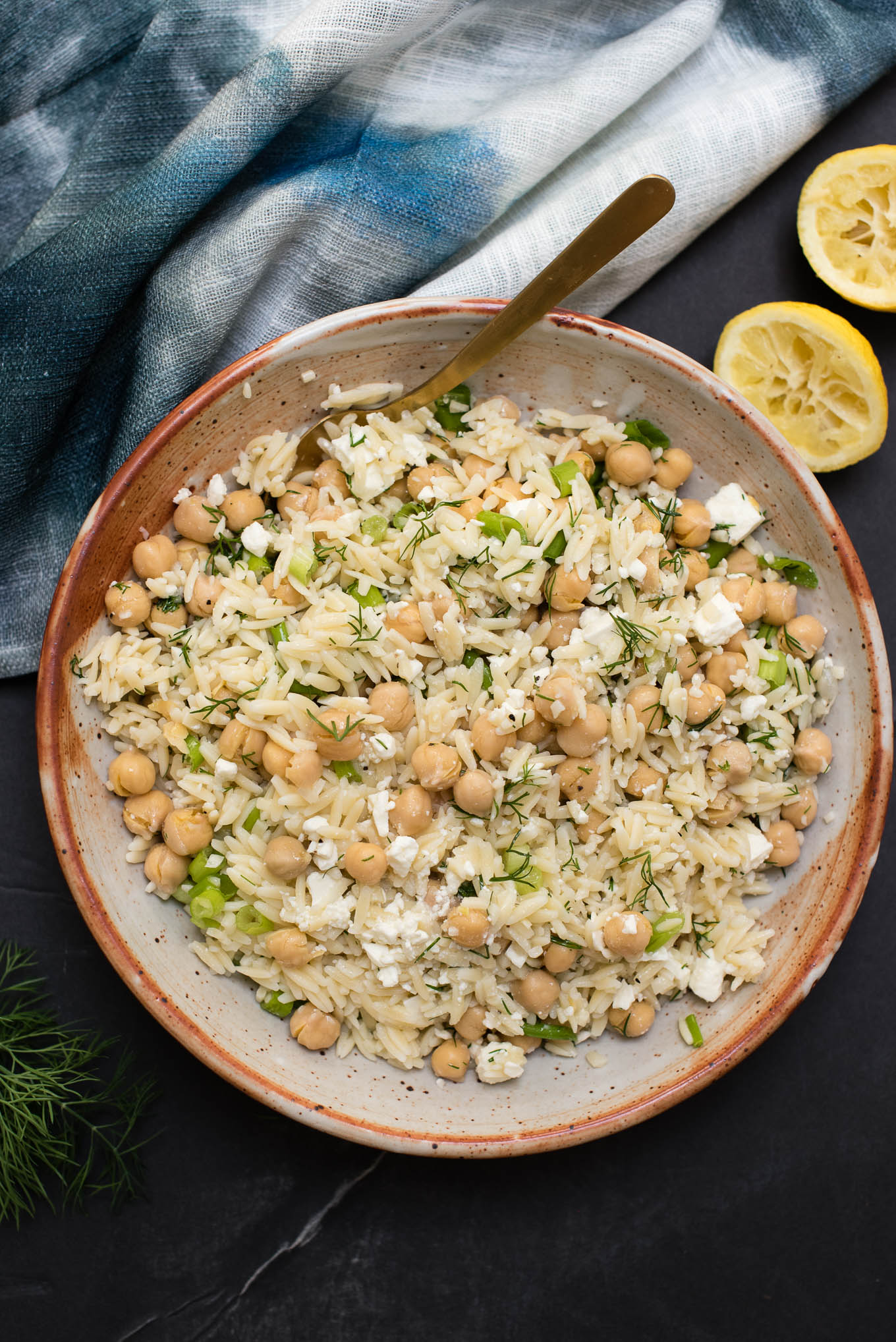 Orzo Chickpea Pasta Salad is a great summer side filled with feta, dill and lots of lemon.