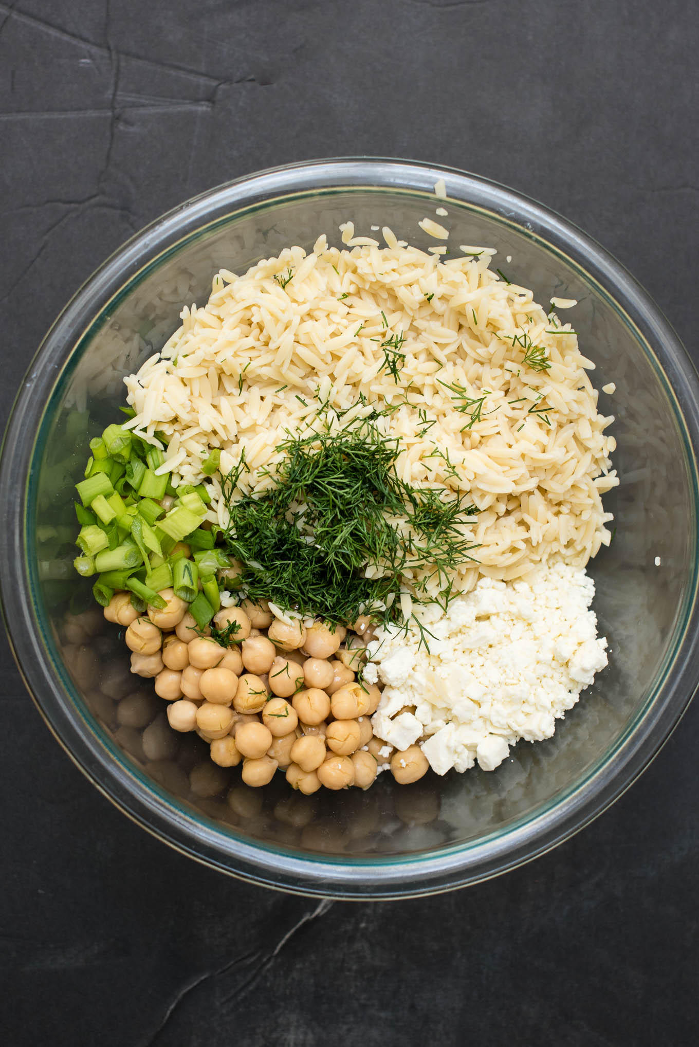 Orzo Chickpea Pasta Salad is a great summer side filled with feta, dill and lots of lemon.