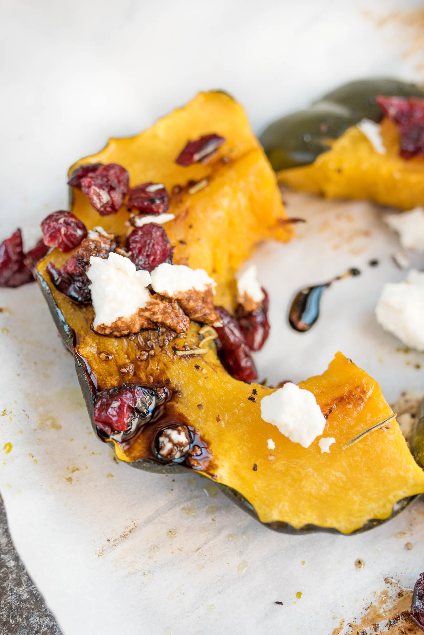 Roasted Acorn Squash with Cranberries, Goat Cheese and Balsamic Glaze #glutenfree #vegetarian side that will be perfect on your Holiday table | www.nutritiouseats.top 