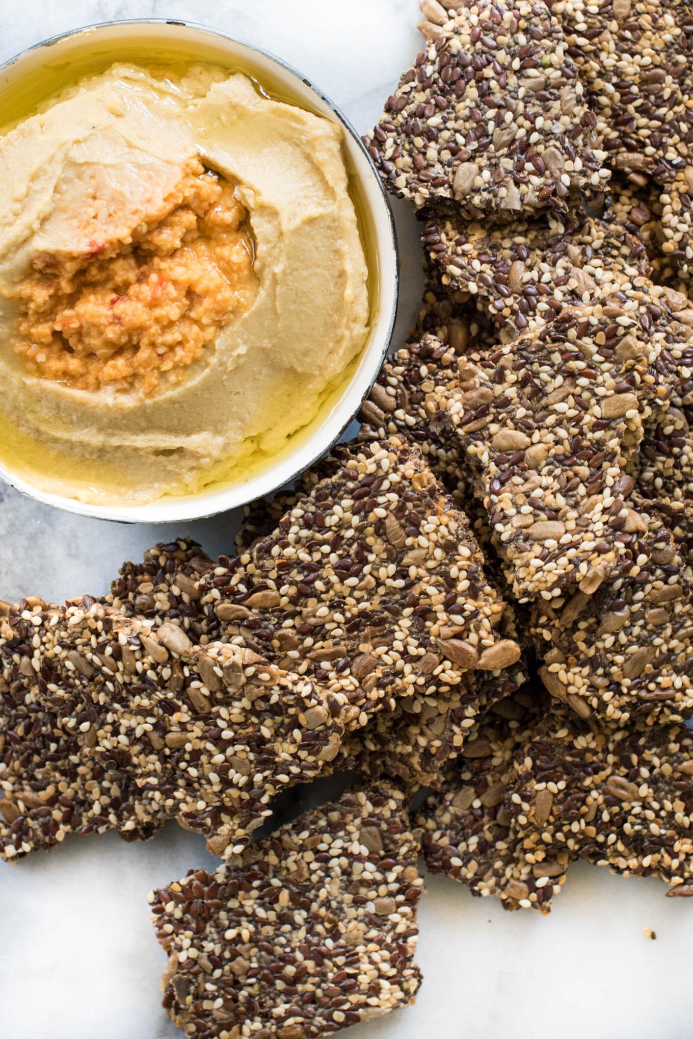 These simple seed crackers will provide a nutritious base for your dipping needs and are gluten and grain free.