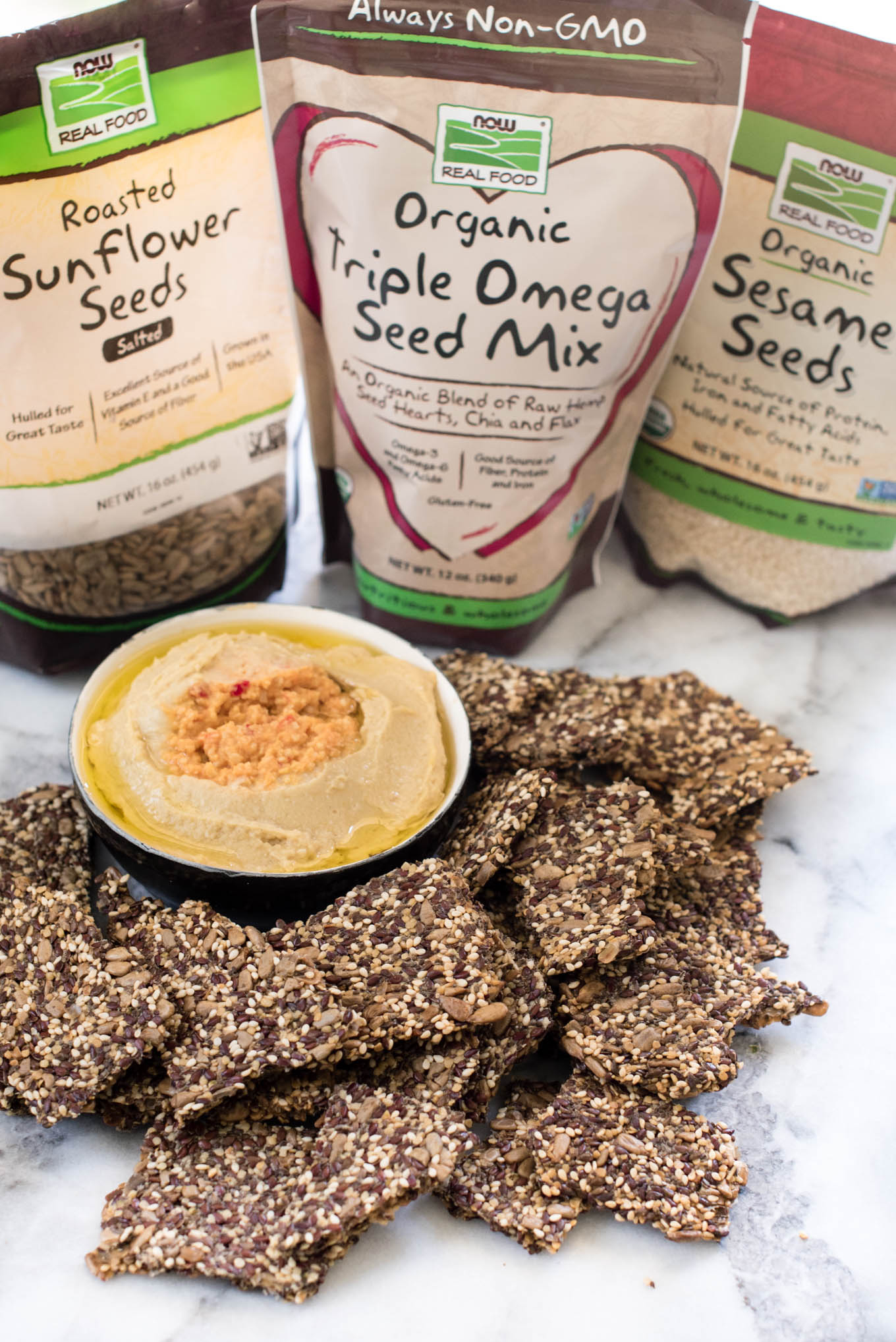 These simple seed crackers will provide a nutritious base for your dipping needs and are gluten and grain free.